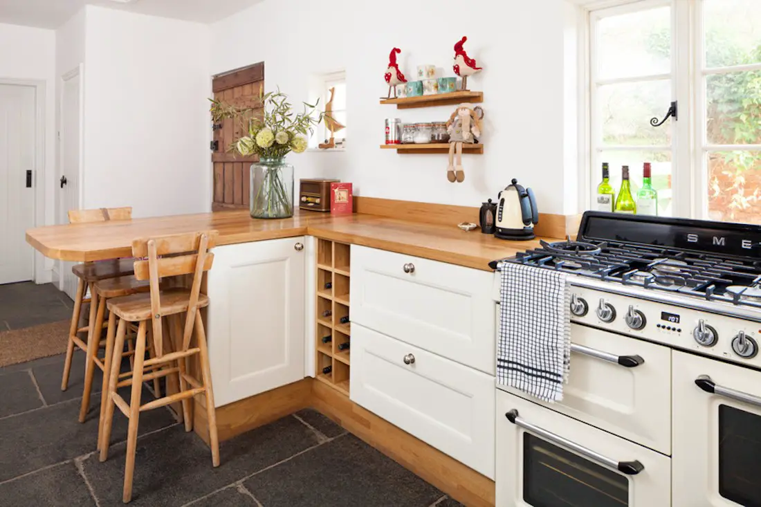 White and oak counter farmstyle kitchen